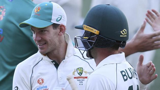 Australia's Joe Burns, right, is congratulated by his captain Tim Paine after Burns hit a 6 to win their match over India on the third day of their cricket test match at the Adelaide Oval in Adelaide, Australia.(AP) Australia's Joe Burns, right, is congratulated by his captain Tim Paine after Burns hit a 6 to win their match over India on the third day of their cricket test match at the Adelaide Oval in Adelaide, Australia.(AP)