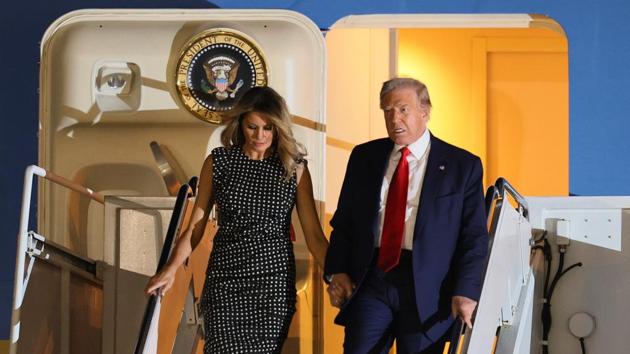 US President Donald Trump and first lady Melania Trump exit from Air Force One at the Palm Beach International Airport on December 23, 2020 in West Palm Beach, Florida.(AFP) US President Donald Trump and first lady Melania Trump exit from Air Force One at the Palm Beach International Airport on December 23, 2020 in West Palm Beach, Florida.(AFP)