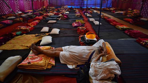An elderly farmer rests inside a shelter space set up at Singhu border near New Delhi on December 11. (Sanchit Khanna / HT Photo) An elderly farmer rests inside a shelter space set up at Singhu border near New Delhi on December 11. (Sanchit Khanna / HT Photo)