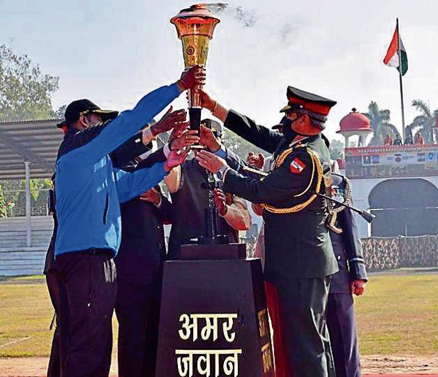 Lt Gen SS Mahal, GOC, Kharga Corps, and other signatories receiving the victory flame at Kharga Stadium in Ambala Cantt. (HT) Lt Gen SS Mahal, GOC, Kharga Corps, and other signatories receiving the victory flame at Kharga Stadium in Ambala Cantt. (HT)