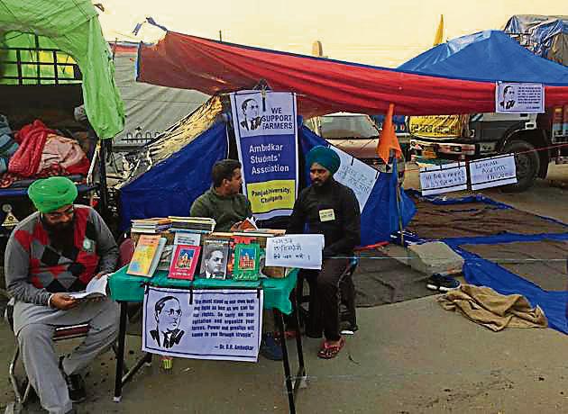 A book stall set up by Gurdeep Singh, a member of Ambedkar Students Association and a student of human rights department of Panjab University, at Singhu border. (HT PHOTO) A book stall set up by Gurdeep Singh, a member of Ambedkar Students Association and a student of human rights department of Panjab University, at Singhu border. (HT PHOTO)