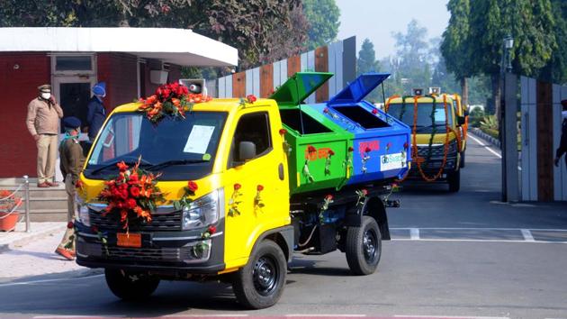 Garbage pickup vehicles on the go for a round of the sectors after being flagged off by UT administrator and Punjab governor VP Singh Badnore at the Punjab Raj Bhawan in Chandigarh earlier this week.(Keshav Singh/HT) Garbage pickup vehicles on the go for a round of the sectors after being flagged off by UT administrator and Punjab governor VP Singh Badnore at the Punjab Raj Bhawan in Chandigarh earlier this week.(Keshav Singh/HT)