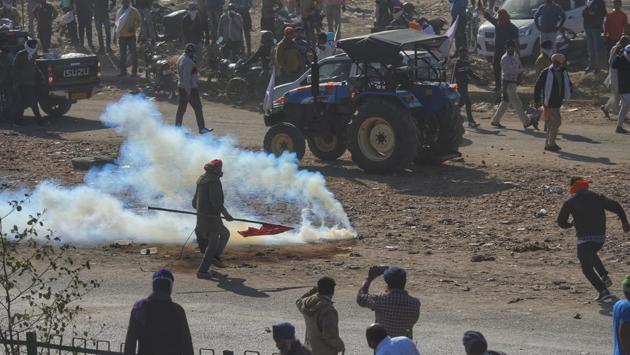 Tear gas canisters fired at farmers’ group by the Delhi police as a dispersion measure to prevent farmers from entering the capital, at Singhu border near New Delhi on November 27. (Amal KS / HT Photo) Tear gas canisters fired at farmers’ group by the Delhi police as a dispersion measure to prevent farmers from entering the capital, at Singhu border near New Delhi on November 27. (Amal KS / HT Photo)