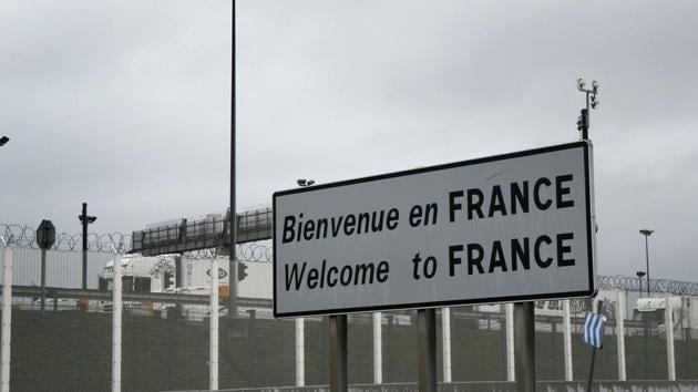 A board showing the French speed limits is set on the Eurotunnel site, meters before the tunnel linking France to Britain, in Coquelles, northern France (AP Photo/Michel Spingler)