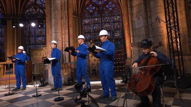 Cello player Gautier Capucon and the Notre Dame Cathedral choir record a Christmas concert inside Notre Dame Cathedral in Paris, France on December 19. The concert was broadcasted on Christmas Day. The choir performed for the first time since the Cathedral was partially destroyed in a fire on April 15, 2019. (MSNDP / Musique Sacree à Notre-Dame de Paris via AP) Cello player Gautier Capucon and the Notre Dame Cathedral choir record a Christmas concert inside Notre Dame Cathedral in Paris, France on December 19. The concert was broadcasted on Christmas Day. The choir performed for the first time since the Cathedral was partially destroyed in a fire on April 15, 2019. (MSNDP / Musique Sacree à Notre-Dame de Paris via AP)