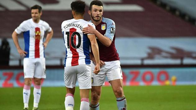 John McGinn of Aston Villa and Andros Townsend of Crystal Palace interact.(Getty Images)