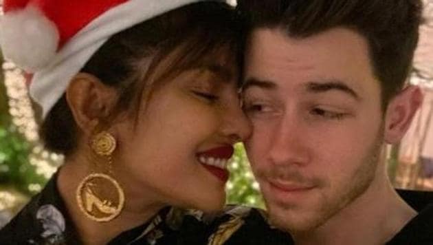 Priyanka Chopra and Nick Jonas pose together.