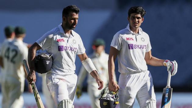 India’s Cheteshwar Pujara, left, and teammate Shubman Gill walk from the field at the end of play play on day one of the Boxing Day cricket test between India and Australia at the Melbourne Cricket Ground (AP) India’s Cheteshwar Pujara, left, and teammate Shubman Gill walk from the field at the end of play play on day one of the Boxing Day cricket test between India and Australia at the Melbourne Cricket Ground (AP)