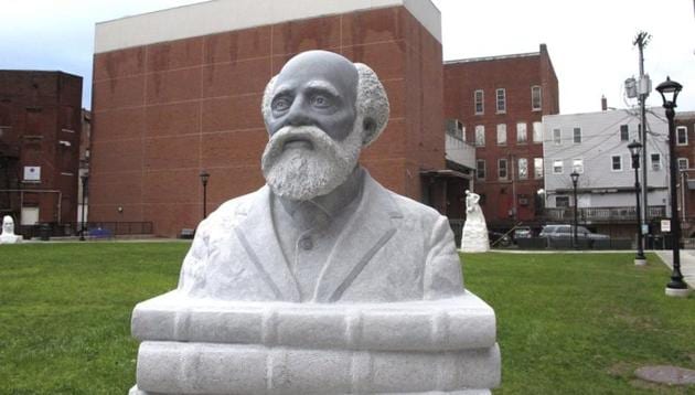 The larger-than-life marble bust of Martin Henry Freeman, a scholar, sits on a stack of books in a downtown square as part of the Rutland Sculpture Trail. (Associated Press) The larger-than-life marble bust of Martin Henry Freeman, a scholar, sits on a stack of books in a downtown square as part of the Rutland Sculpture Trail. (Associated Press)