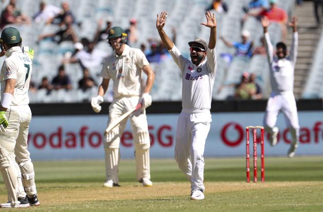 India's Ajinkya Rahane, appeals successfully for the dismissal of Australia's Cameron Green, second left, during play on day one of the Boxing Day cricket test between India and Australia at the Melbourne Cricket Ground, Melbourne, Australia, Saturday, Dec. 26, 2020. (AP Photo/Asanka Brendon Ratnayake) (AP)