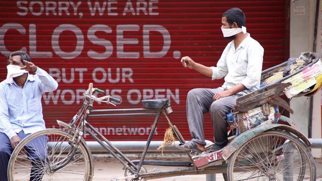 While the virus affected all classes, the economic fallout of the Covid-19 pandemic was particularly devastating for those in the informal sector who found themselves on the streets, without their livelihoods.(Sanjeev Sharma/Hindustan Times) While the virus affected all classes, the economic fallout of the Covid-19 pandemic was particularly devastating for those in the informal sector who found themselves on the streets, without their livelihoods.(Sanjeev Sharma/Hindustan Times)