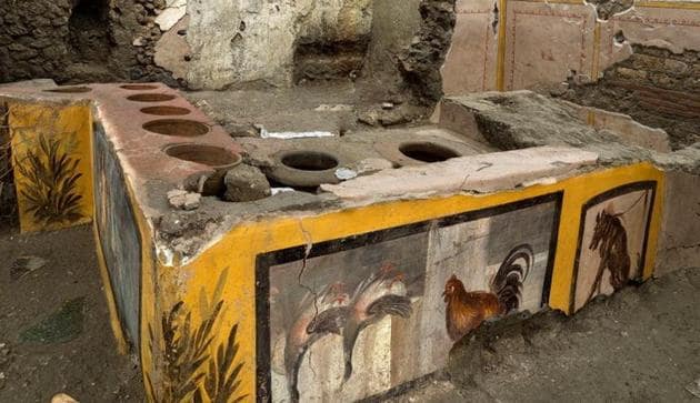 The front of the counter was decorated with brightly coloured frescoes, some depicting animals that were part of the ingredients in the food sold, such as a chicken and two ducks hanging upside down.(REUTERS)