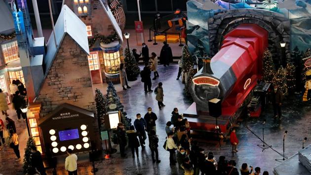 People visit a Harry Potter-themed booth inside a shopping complex on Christmas Day, following the new cases of Covid-19 in Beijing, China on December 25, 2020. (Reuters Photo)