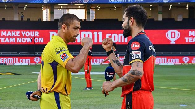 Dubai: Chennai Super Kings (CSK) skipper MS Dhoni and Royal Challengers Bangalore (RCB) skipper Virat Kohli greet each other(PTI) Dubai: Chennai Super Kings (CSK) skipper MS Dhoni and Royal Challengers Bangalore (RCB) skipper Virat Kohli greet each other(PTI)