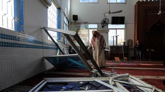 Palestinians assess damage caused to a mosque by an Israeli air strike on Gaza City, on December 26, 2020. (AFP) Palestinians assess damage caused to a mosque by an Israeli air strike on Gaza City, on December 26, 2020. (AFP)