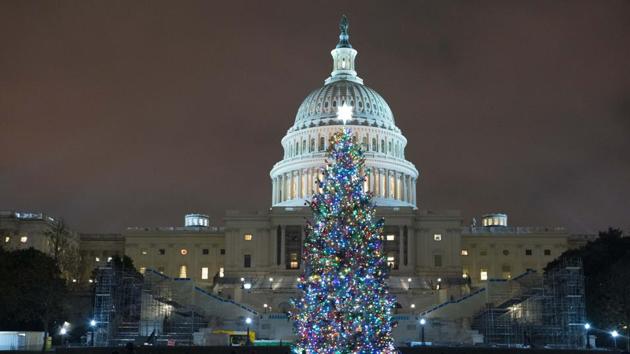 On Christmas Day, Trump spent most of the day golfing, with close ally and Republican Senator Lindsey Graham, according to a source familiar with his activities. In a tweet, he said he has had many telephone calls and meetings at his golf club and urged lawmakers to give people more money. (AP) On Christmas Day, Trump spent most of the day golfing, with close ally and Republican Senator Lindsey Graham, according to a source familiar with his activities. In a tweet, he said he has had many telephone calls and meetings at his golf club and urged lawmakers to give people more money. (AP)