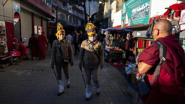 Police women on special duty patrol the streets ensuring people are following Covid-19 safety guidelines properly in Dharmshala on December 26. Meanwhile, the daily Covid-19 death toll fell below 300 on December 25 — 251 deaths were reported on the day. An additional xxx deaths have been recorded since then. (Ashwini Bhatia / AP) Police women on special duty patrol the streets ensuring people are following Covid-19 safety guidelines properly in Dharmshala on December 26. Meanwhile, the daily Covid-19 death toll fell below 300 on December 25 — 251 deaths were reported on the day. An additional xxx deaths have been recorded since then. (Ashwini Bhatia / AP)