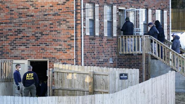 FBI and ATF agents investigate a home in Nashville, Tennessee. An explosion that shook the largely deserted streets of downtown Nashville early Christmas morning shattered windows, damaged buildings, and wounded three people. Authorities said they believed the blast was intentional. (AP) FBI and ATF agents investigate a home in Nashville, Tennessee. An explosion that shook the largely deserted streets of downtown Nashville early Christmas morning shattered windows, damaged buildings, and wounded three people. Authorities said they believed the blast was intentional. (AP)