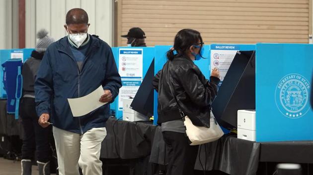 An estimated 108 million people voted before Election Day, either through early in-person voting or by mailing or dropping off absentee ballots.(AFP Photo) An estimated 108 million people voted before Election Day, either through early in-person voting or by mailing or dropping off absentee ballots.(AFP Photo)