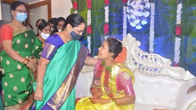 Telangana Chief Minister K Chandrashekhar Rao’s wife K Shobha with their adopted daughter Pratyusha ahead of her marriage. (HT PHOTO) Telangana Chief Minister K Chandrashekhar Rao’s wife K Shobha with their adopted daughter Pratyusha ahead of her marriage. (HT PHOTO)