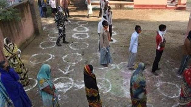 Bihar assembly elections were the first full-fledged polls to be held amid coronavirus. Over 4 crore of the total over 7 crore voters exercised their franchise. To ensure distancing norms, the EC restricted the number of voters per polling station to 1,000 from 1,200. This led to the increase in the number of polling stations.(AP) Bihar assembly elections were the first full-fledged polls to be held amid coronavirus. Over 4 crore of the total over 7 crore voters exercised their franchise. To ensure distancing norms, the EC restricted the number of voters per polling station to 1,000 from 1,200. This led to the increase in the number of polling stations.(AP)