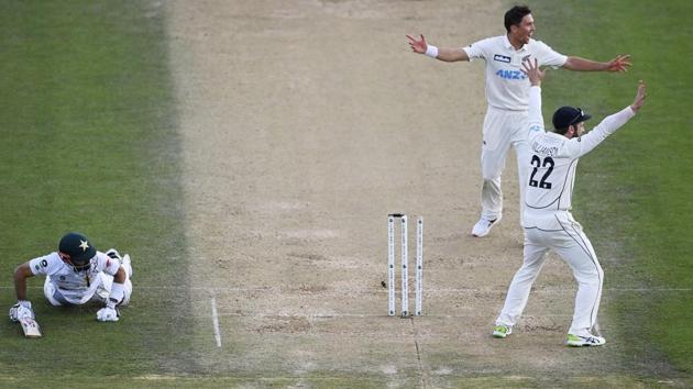 Pakistan captain Mohammad Rizwan, left, is run out after a direct throw by Mitchell Santner, not pictured, as Trent Boult and Kane Williamson, right, appeal during play on day three of the first cricket test between Pakistan and New Zealand at Bay Oval, Mount Maunganui. (AP) Pakistan captain Mohammad Rizwan, left, is run out after a direct throw by Mitchell Santner, not pictured, as Trent Boult and Kane Williamson, right, appeal during play on day three of the first cricket test between Pakistan and New Zealand at Bay Oval, Mount Maunganui. (AP)