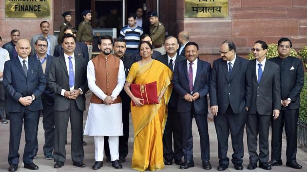 Budget 2020 saw a major overhaul in the way incomes are taxed for all but the highest tax brackets in the country. Finance Minister Sitharaman, holding her "Bahi Khata" presented the budget as a simplification of taxes for greater ease along with new measures. (Ajay Aggarwal / HT Photo) Budget 2020 saw a major overhaul in the way incomes are taxed for all but the highest tax brackets in the country. Finance Minister Sitharaman, holding her "Bahi Khata" presented the budget as a simplification of taxes for greater ease along with new measures. (Ajay Aggarwal / HT Photo)