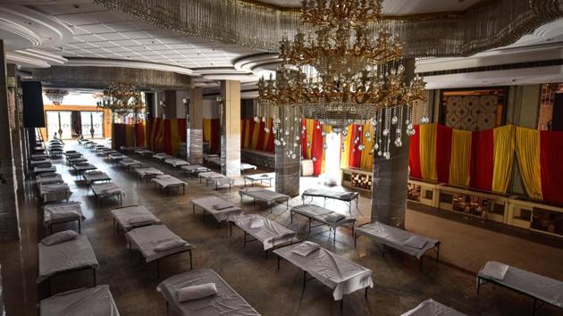 The early concentration of Covid-19 cases in urban centres began taking a toll as cases neared 1 million. Delhi's strained health infrastructure was remedied by the requisitioning of empty banquet halls and hotels to act as makeshift quarantine facilities. (Sanchit Khanna / HT Photo) The early concentration of Covid-19 cases in urban centres began taking a toll as cases neared 1 million. Delhi's strained health infrastructure was remedied by the requisitioning of empty banquet halls and hotels to act as makeshift quarantine facilities. (Sanchit Khanna / HT Photo)