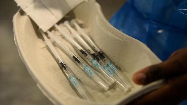 A healthcare worker holds syringes of the Pfizer/BioNtech COVID-19 vaccine at Notre Dame home care, as the coronavirus disease (COVID-19) outbreak continues in Brussels, Belgium.(REUTERS) A healthcare worker holds syringes of the Pfizer/BioNtech COVID-19 vaccine at Notre Dame home care, as the coronavirus disease (COVID-19) outbreak continues in Brussels, Belgium.(REUTERS)