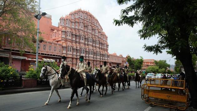 Originally intended as a 21-day circuit breaker for the spread of the coronavirus, eventualities forced the extension of the restrictions three more times to a total lockdown period of 68-days for India until May 31. Seen here, police personnel on a flag march in Jaipur. (Himanshu Vyas / HT Photo) Originally intended as a 21-day circuit breaker for the spread of the coronavirus, eventualities forced the extension of the restrictions three more times to a total lockdown period of 68-days for India until May 31. Seen here, police personnel on a flag march in Jaipur. (Himanshu Vyas / HT Photo)