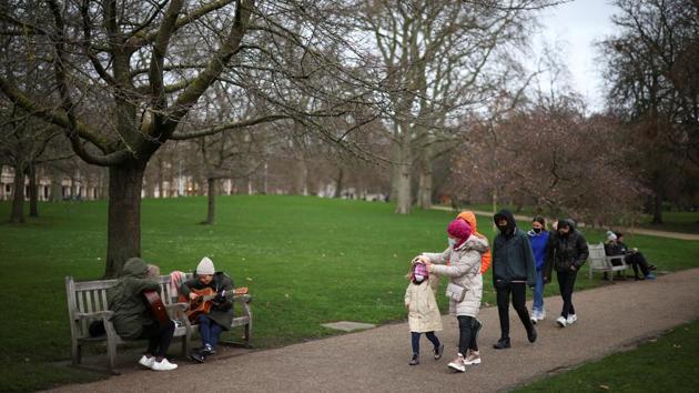 People walk through St James's Park, amid the coronavirus disease outbreak in London on December 26. If the AstraZeneca-Oxford vaccine is authorized this week, members of the public could start receiving it from Jan. 4. Britain has ordered 100 million doses, compared to 40 million doses of the Pfizer-BioNTech shot, AP reported. (Henry Nicholls / REUTERS) 