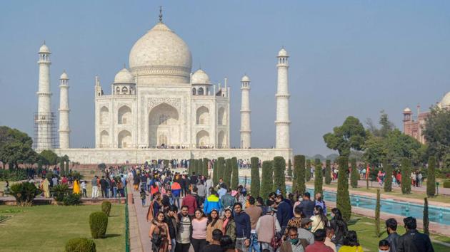 A rush of tourists at Taj Mahal in Agra on December 26. In a statement, the Ministry of Home Affairs (MHA) said that it has issued fresh guidelines for surveillance with regard to Covid-19 that will remain in force till January 31, as it asked the states and union territories to keep a strict vigil to prevent any rise in cases during the New Year celebrations and the winter season. (PTI) A rush of tourists at Taj Mahal in Agra on December 26. In a statement, the Ministry of Home Affairs (MHA) said that it has issued fresh guidelines for surveillance with regard to Covid-19 that will remain in force till January 31, as it asked the states and union territories to keep a strict vigil to prevent any rise in cases during the New Year celebrations and the winter season. (PTI)