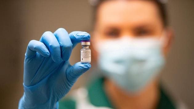 A nurse holds a phial of the Pfizer/BioNTech Covid-19 vaccine at University Hospital in Coventry. (REUTERS) A nurse holds a phial of the Pfizer/BioNTech Covid-19 vaccine at University Hospital in Coventry. (REUTERS)