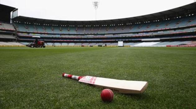 A bat and ball are seen on the turf.(Getty Images)