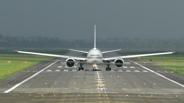 An aircraft seen on the runway at Netaji Subhash Chandra Bose International Airport at Dum Dum in Kolkata.(Samir Jana / Hindustan Times)