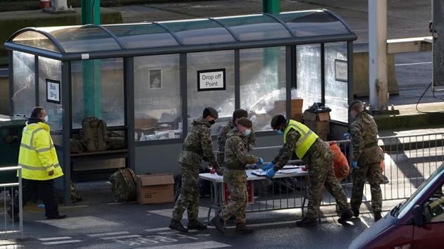 British Army officers work with NHS & Tesr and Trace COVID-19 testers at the Port of Dover, in Dover on the south-east coast of England. (AFP) British Army officers work with NHS & Tesr and Trace COVID-19 testers at the Port of Dover, in Dover on the south-east coast of England. (AFP)