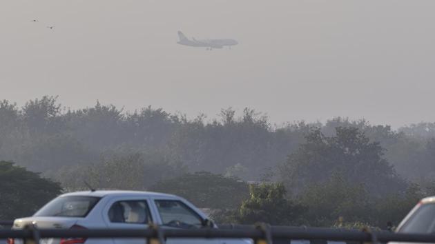 An aircraft in flight is pictured at a distance from NH-48 in New Delhi on December 28. On December 21, India joined a growing list of countries to seal off access to people who have been to the UK, suspending all flights to and from the country between December 23 and December 31 to stop the spread of a new variant. The suspension has been extended until January 7 now. (Sanjeev Verma / HT Photo) An aircraft in flight is pictured at a distance from NH-48 in New Delhi on December 28. On December 21, India joined a growing list of countries to seal off access to people who have been to the UK, suspending all flights to and from the country between December 23 and December 31 to stop the spread of a new variant. The suspension has been extended until January 7 now. (Sanjeev Verma / HT Photo)