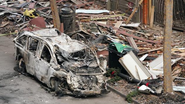 A vehicle destroyed in a Christmas Day explosion remains on the street Tuesday in Nashville, Tenn. (AP) A vehicle destroyed in a Christmas Day explosion remains on the street Tuesday in Nashville, Tenn. (AP)