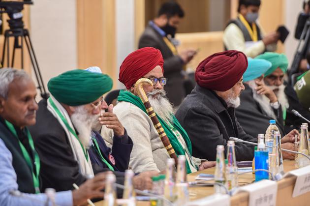 Farmers leaders during a meeting with Union Minister for Agriculture & Farmers Welfare Narendra Singh Tomar (unseen) and Union Minister for Commerce and Industry Piyush Goyal (unseen) over the new farm laws, at Vigyan Bhawan in New Delhi.(PTI) Farmers leaders during a meeting with Union Minister for Agriculture & Farmers Welfare Narendra Singh Tomar (unseen) and Union Minister for Commerce and Industry Piyush Goyal (unseen) over the new farm laws, at Vigyan Bhawan in New Delhi.(PTI)