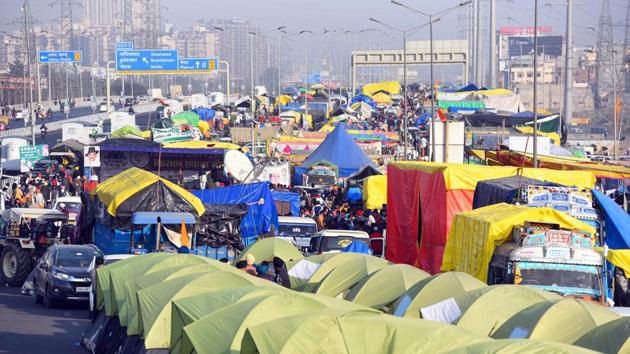 Tents set up on a blocked section of National Highway-9 at Ghazipur Border (Delhi-UP) where farmers are camped in protest against new farm laws, in New Delhi on Tuesday.(Raj K Raj/HT PHOTO)