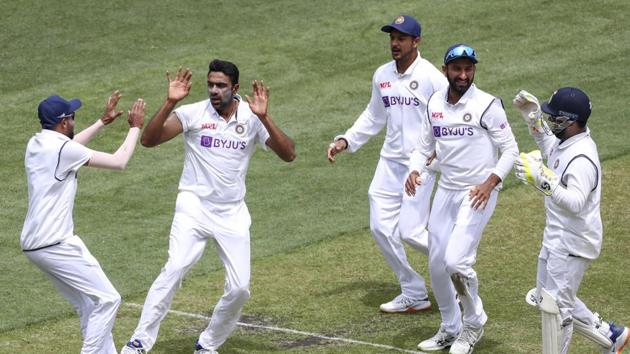 Melbourne:India's Ravichandran Ashwin, second left, celebrates with teammates (AP) Melbourne:India's Ravichandran Ashwin, second left, celebrates with teammates (AP)