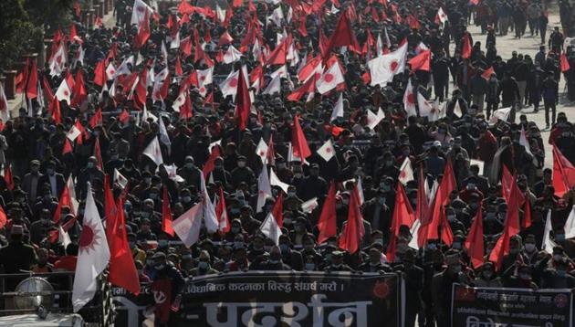 Protesters affiliated with a faction of the ruling Nepal Communist Party take part in a rally against the dissolution of parliament, in Kathmandu, Nepal.(REUTERS)