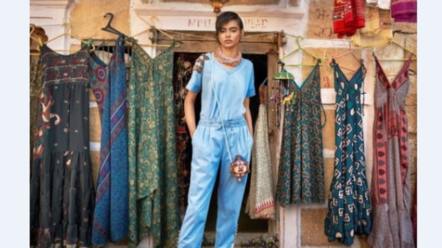 Kiyara wears a Magyar sleeve recyled denim top with embroidered patches in ice wash paired with slip-on recycled denim pants with lace and button detailing.(Photo: Instagram/StudioVerandah)