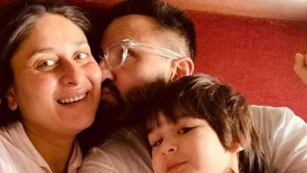 Kareena Kapoor poses with Taimur and Saif Ali Khan.