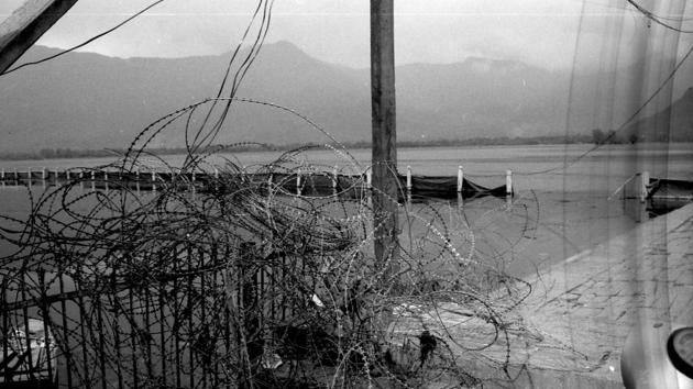 “As we left, Ahmad and I stepped over a roll of barbed concertina wire that enclosed the park we sat in. He smiled at me and said, “I don’t see this as a bad thing. The barbed wire that alters the direction of our paths, the army convoys that leave us waiting endlessly in the traffic—these things polish our memories.” From the 113th cup of nun chai. (Alana Hunt)