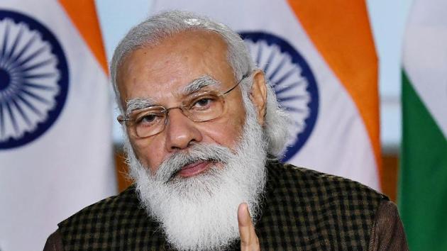 Prime Minister Narendra Modi addresses at the foundation stone laying ceremony of AIIMS in Rajkot, through video conferencing.(PTI) Prime Minister Narendra Modi addresses at the foundation stone laying ceremony of AIIMS in Rajkot, through video conferencing.(PTI)
