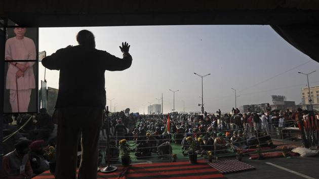 A farmer addresses protesting farmers blocking a highway at the Delhi-Uttar Pradesh state border. (AP) A farmer addresses protesting farmers blocking a highway at the Delhi-Uttar Pradesh state border. (AP)