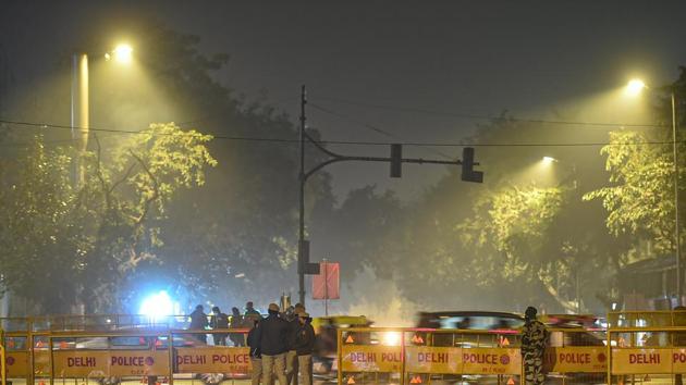 Barricades put in place on a road as security has been beefed up on the eve of New Year in New Delhi.(PTI)