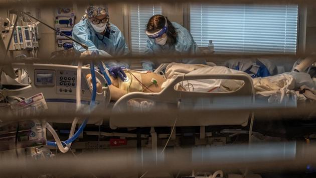 A Covid-19 patient inside the Sutter Roseville medical center ICU in Roseville, California.(AP) A Covid-19 patient inside the Sutter Roseville medical center ICU in Roseville, California.(AP)