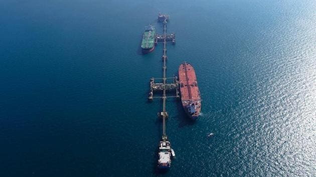 An aerial photo shows oil tankers load crude oil at Iraq’s Al-Basra Offshore Terminal in Basra, Iraq, Sunday, December 27, 2020.(AP) An aerial photo shows oil tankers load crude oil at Iraq’s Al-Basra Offshore Terminal in Basra, Iraq, Sunday, December 27, 2020.(AP)